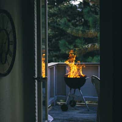 A flaming grill on the terrace.